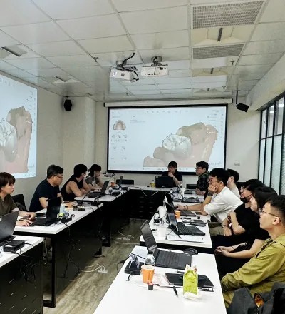 Students practicing 3Shape implant guide design