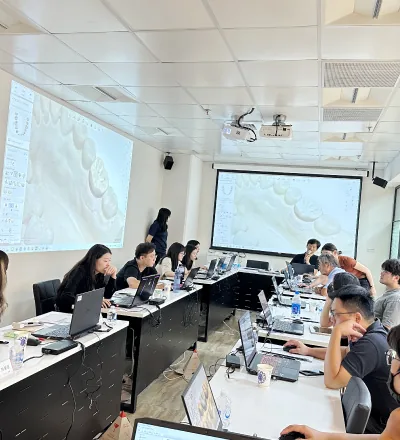 Students working in a customized abutment design course